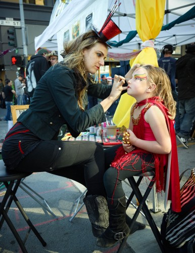 Painting A Face by Peter Adams.